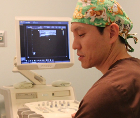 Surgery after care check with ultrasound monitoring for safe and effective recovery.