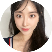 Selfie of woman after filler procedure.