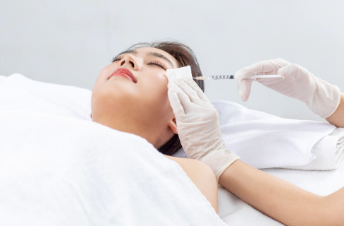 fat melting injection being injected in the face.