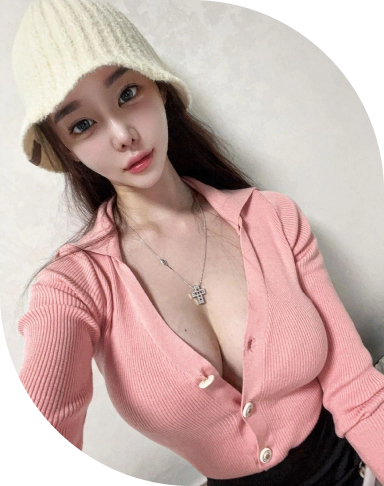 Cleavage with even with cardigan clothing after Korean breast augmentation.