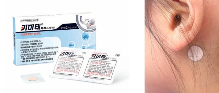 Kimate scopolamine patch applied behind the ear as a precaution after salivary gland reduction surgery.
