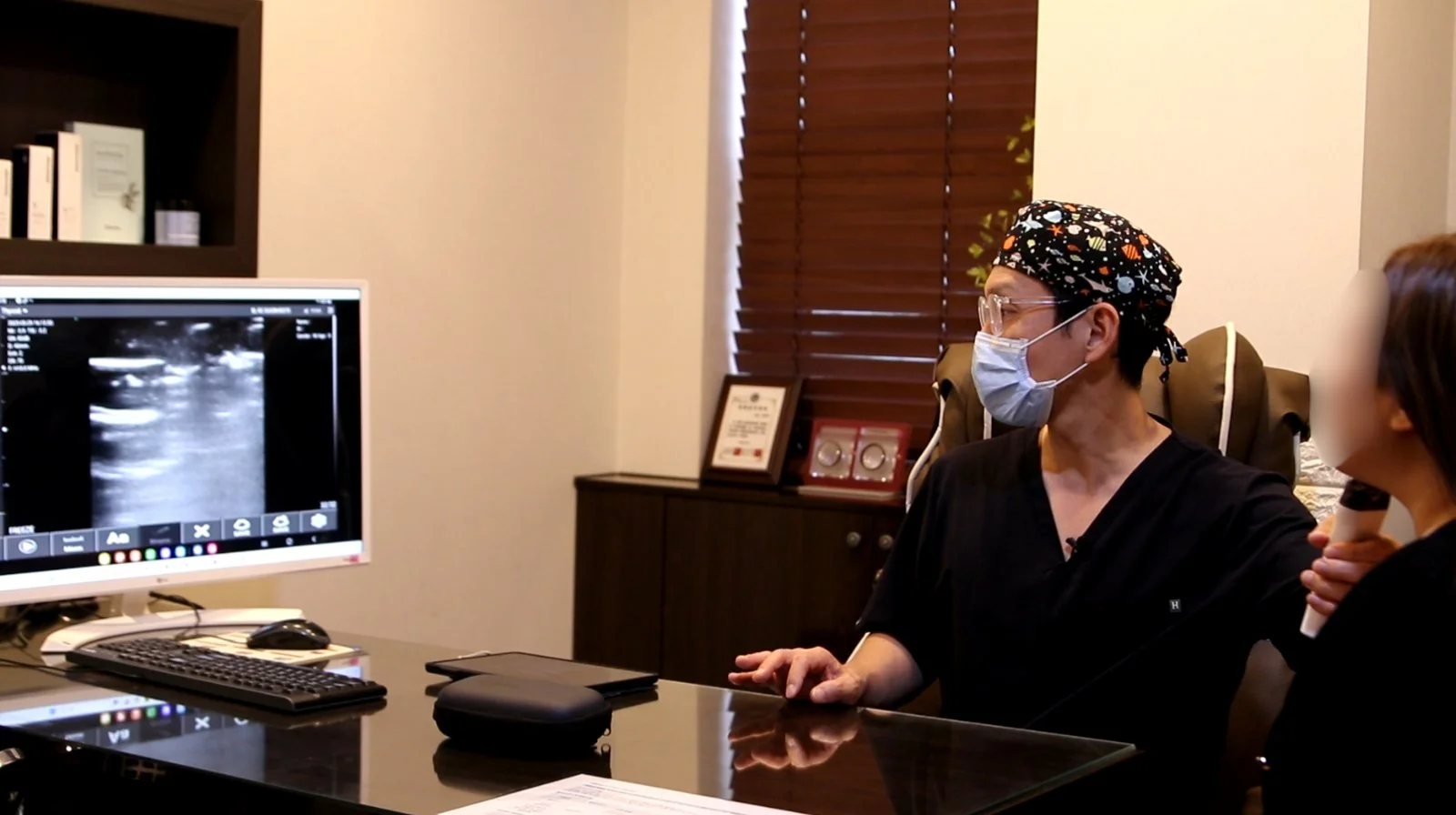 Ultrasound consultation for submandibular gland reduction planning at MINE clinic in Seoul